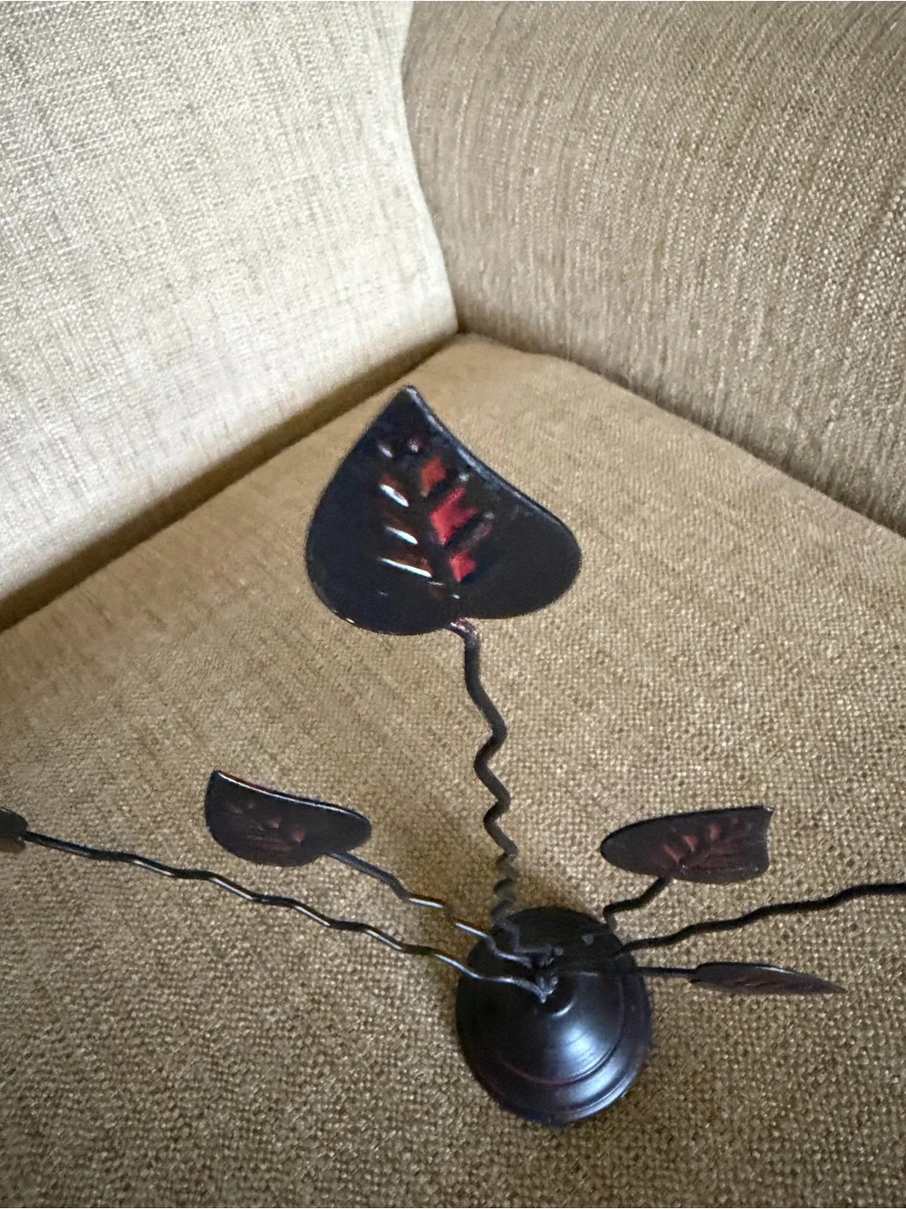 Black Metal Leaf Table Decor with Red Accents